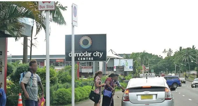 Taxis parked on a yellow line under a no stopping road sign in front of Damodar City on Grantham Road. Photo: Ronald Kumar