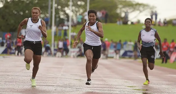Adi Cakobau School’s Domitila Naita (second from left) leads the final of the intermediate girls 100 metres during the Triple N Zone at the HFC Bank Stadium, Suva, on August 2, 2022. Photo: Ronald Kumar.