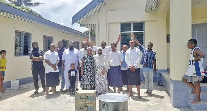 Mufti (Jurist of Islam), Mohammed Zain Ul Abidean with his family providing lunch for the Bemanu Clan who is guarding the body of the late Tui Nawaka, Ratu Asaeli Driu at the Nadi Hospital morgue.