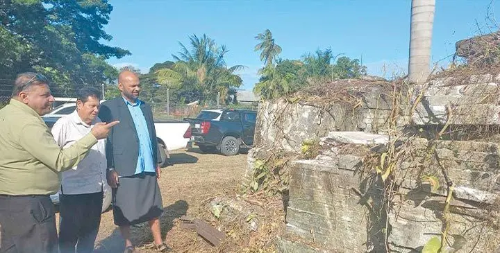From left: Sugar Cane Growers Fund chief executive officer Raj Sharma, chairman Ahemad Bhamji and Commissioner Western Apolosi Lewaqai look at some old bricks left on the land acquired. Photo: Charles Chambers