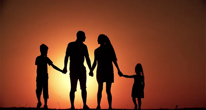 4k-silhouette-of-a-family-father-mother-and-two-children-son-and-daughter-walking-in-the-background-of-the-sunset-slow-motion_sqioms7r_thumbnail-full01 copy