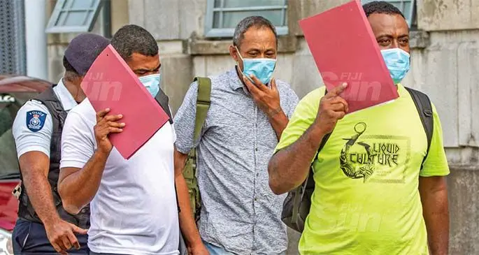 Gauna Bera Halofaki (front-right), Pauliasi Davetawalu (back), 41, Joji Vuli (second from left ), 29, have been fined $250 each by the Suva Magistrate Court on April 29, 2021, after they pleaded guilty to social gathering for the purposes of drinking alcohol. Photo: Leon Lord.