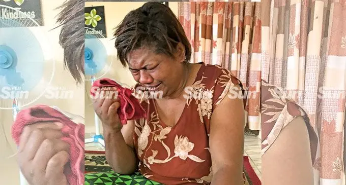 Siteri Raikoro weeps for her husband at her sister’s home in Labasa on June 6, 2022.  Photo: Shratika Naidu.  