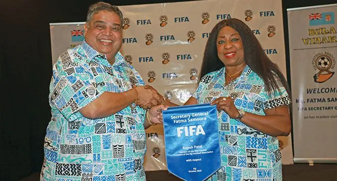 Fiji Football Association president Rajesh Patel (left) receives a souvenir from FIFA general secretary Fatma Samoura during a dinner at the Grand Pacific Hotel, Suva, on October 16, 2022. Photo: Fiji FA Media