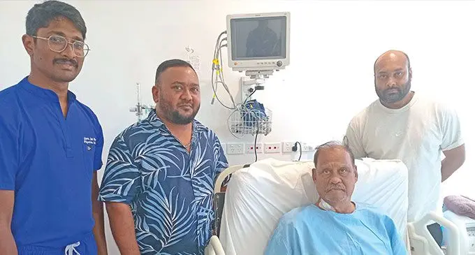 (L - R) Physician assistant Guru Sai Prasad, PSH CEO and Director Parvish Kumar, patient Suresh Chand and his son Samil Sanjesh Chand at PSH Nadi after the operation. Photo: Charles Chamber