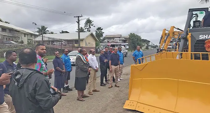 The permanent secretary for the Ministry of Public Works, Meteorological Services and Transport Paula Baleilevuka (pictured with a garland), attended the handing over of trucks and bulldozers at the Vision Motors Showroom on Grantham Road, Suva.