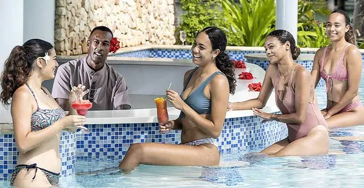 Guests enjoying themselves at a poolside bar at the Marriott Resort Fiji Momi Bay. Photo: Marriott Resort Fiji Momi Bay