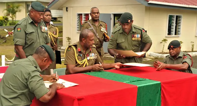 Changing of the Commanding-Officer (CO) Land Force Command Battalion (BN) appointment between the outgoing CO Major (Maj) Jeremaia Waqanisau (left) and Major Asaeli Toanikeve (right) was officiated by the Land Force Commander Colonel Manoa Gadai. Photo: RFMF Media Cell