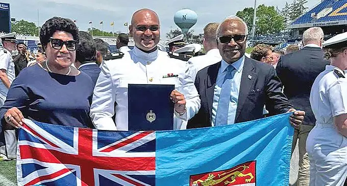 Ensign Adrian Narayan (middle). and Fiji's permanent representative to the United Nations Filipo Tarakinikini (right) with wife Amelia.
