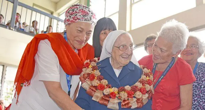 The late Sister Angela Cavey (with garland).