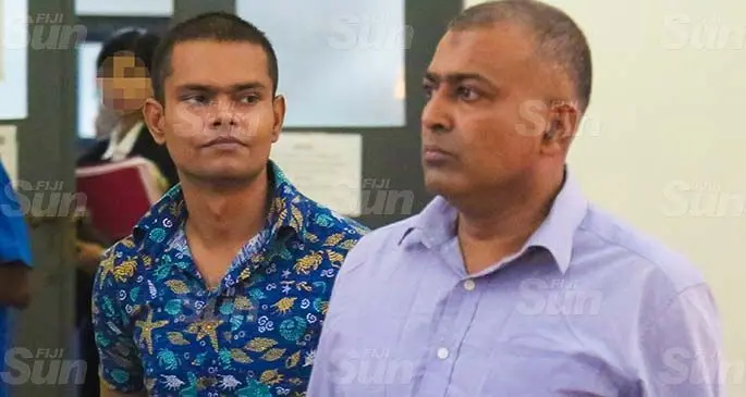 (From right) Ronil Ravikesh Chand and Karim Begg outside the Suva High Court on May 8, 2020. Photo: Kelera Sovasiga