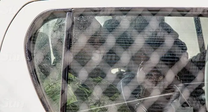 Penijamini Naviti was taken to the Nasinu Court in a Police vehicle yesterday. Photo: Leon Lord