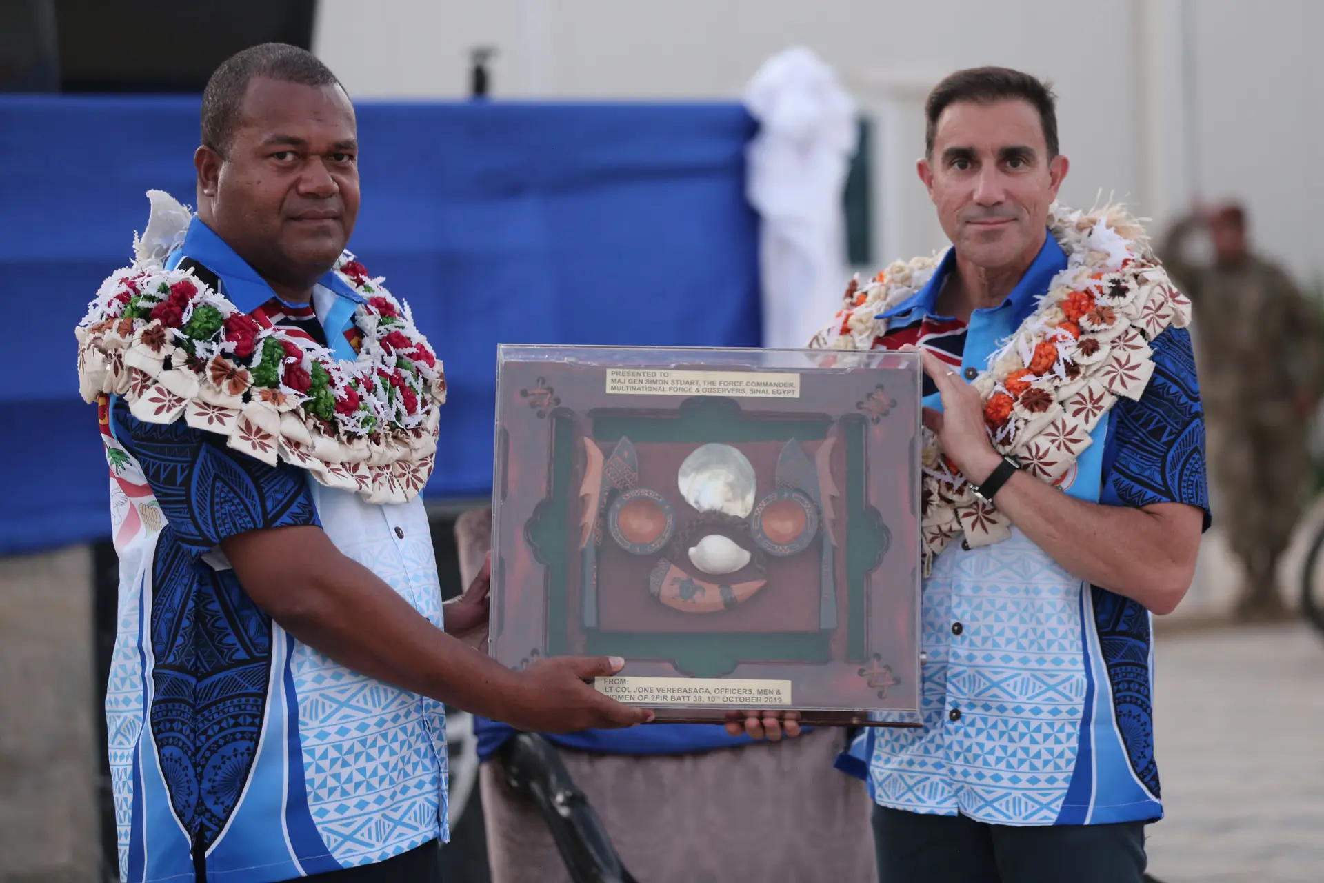 From left: 2ND Fiji Infantry Regiment Battalion 3B Commanding Officer (CO) Lieutenant Colonel Jone Verebasaga presents 2FIR gift to the MFO Commander Australian Army Officer Major General Simon Stuart. Photo: Captain Mark Scott