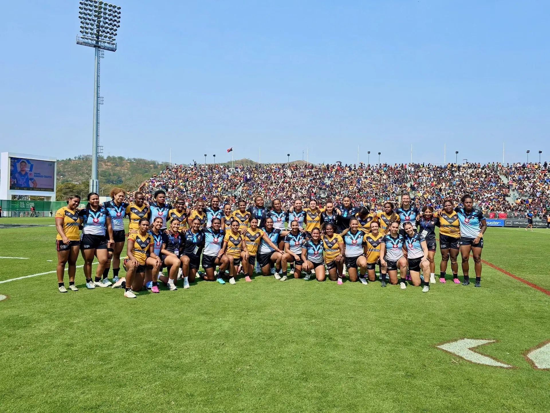 The Fiji Bulikula and Papua New Guinea Orchids team following their Rugby League World Cup pool match at Port Moresby on October 24, 2026.