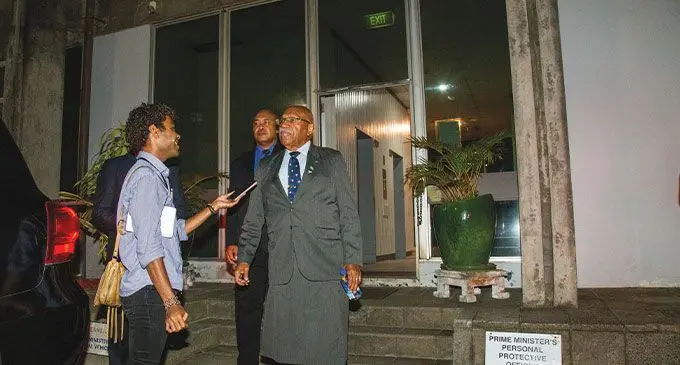 On Christmas Eve last year, after Cabinet was sworn-in, Prime Minister Sitiveni Rabuka, is pictured here with our journalist, Jone Salusalu at the Office of the Prime Minister in Suva. Photo: Leon Lord