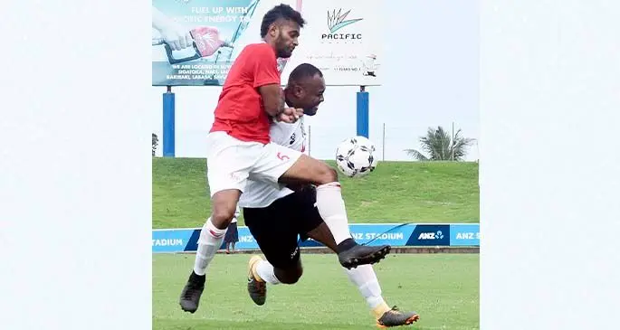 Rewa defender Patrick Joseph challenges Suva striker Christopher Wasasala during the Vodafone Premier League clash at the ANZ Stadium, Suva on July 19,2020. Photo: Fiji FA Media.