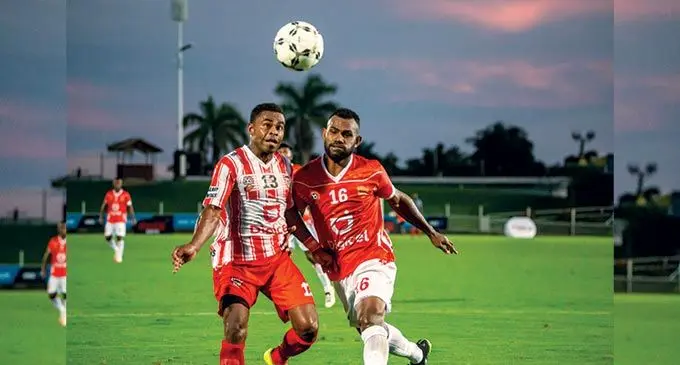 4R Electrical Labasa’s Apenisa Anare (left) battles possession against Glamada Investment Rewa player Kavaia Rawaqa during the first round of the Digicel Fiji FACT at the ANZ Stadium on April 22, 2022. Photo: Leon Lord