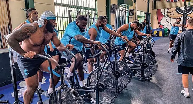 Vodafone Flying Fijians prop Peni Ravai (first left) and Luke Tagi (second) with team members during their gym training session in Madrid, Spain on November 2, 2021. Photo: FRU Media