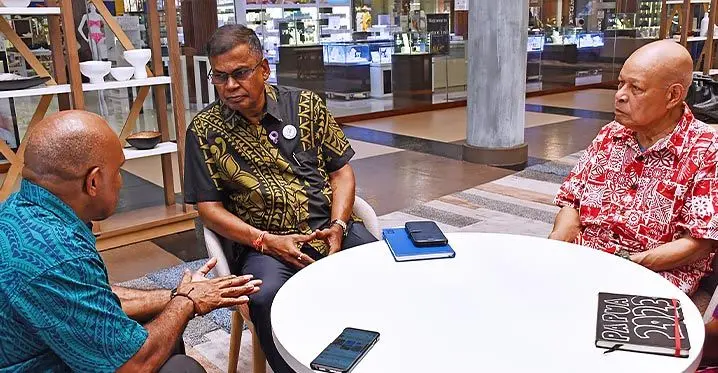 Minister for Finance Biman Prasad right with a delegate from Papua New Guinea during the Pacific Island Forum on February 24 , 2023 retreat . Photo: DEPTFO NEWS