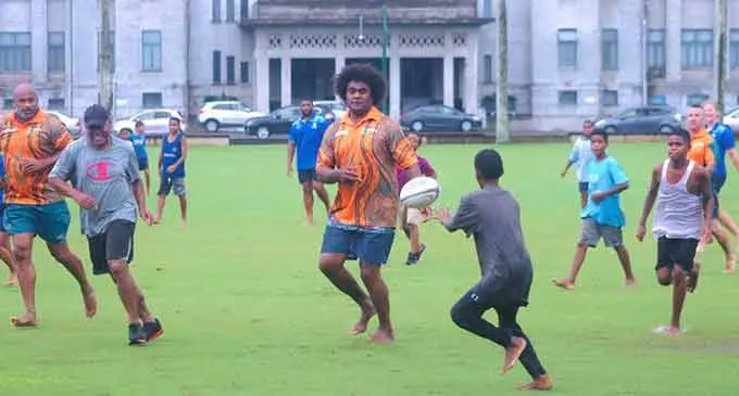 Radike Samo and Lote Tuqiri having a game of rugby with children and those that attended the Vuvale programme at Suva’s Albert Park on June 2, 2023. Photo: FRU Media 