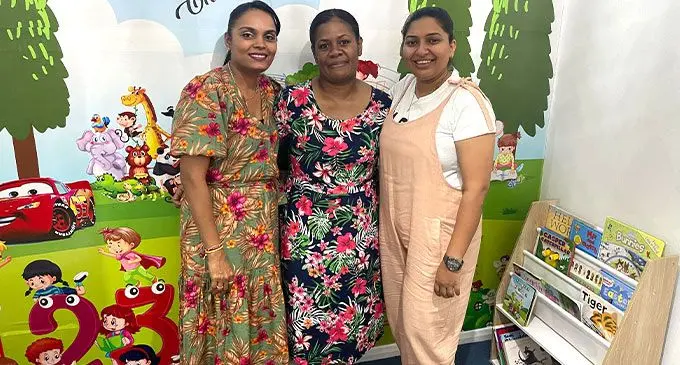 Kids Life Care directors, Bhawna Narayan (left), and Neha Nikita Lal (right) with the teacher-in-charge, Sainiana Tinai (middle) at the centre’s library room on July 10, 2022.