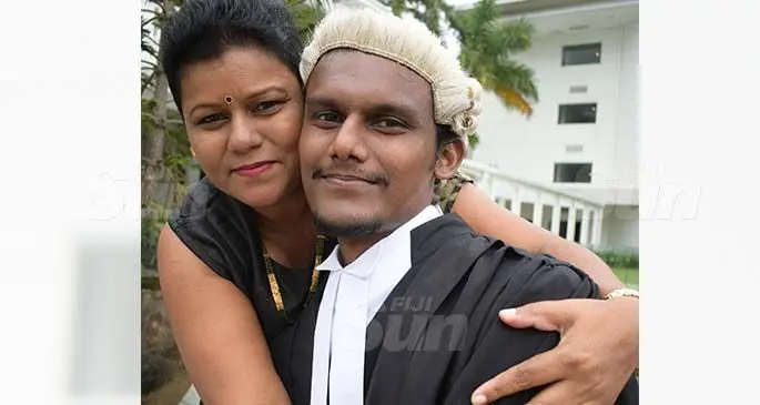 Anita Singh congratulate her son, Sidhant Singh following his admission into the Bar by Acting Chief Justice Kamal Kumar at Grand Pacific Hotel on March 12, 2021. Photo: Ronald Kumar.