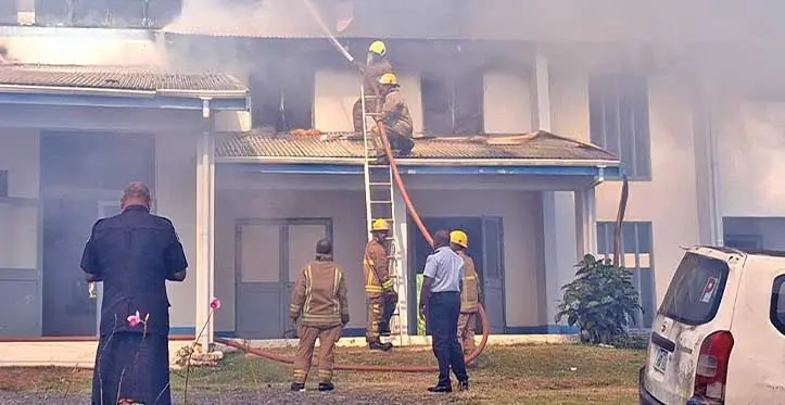 Officers try to control the fire at the Lautoka Police Station’s Bachelors Barrack. Photo: Waisea Nasokia