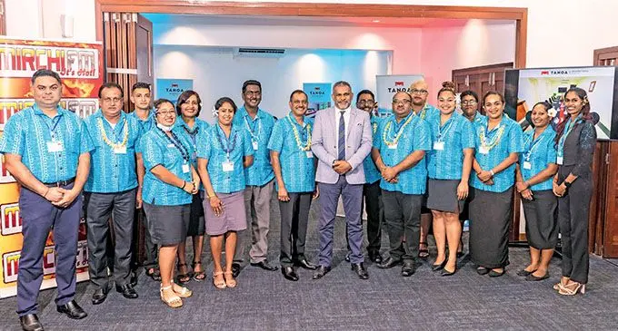 Minister for Commerce, Trade, Tourism and Transport Faiyaz Koya (centre, in grey suit) with senior executives of the Tanoa Hotel Group during the tradeshow and launch of signature dishes at Tanoa Plaza, Suva, on November 10, 2021.