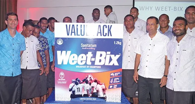 Fiji Airways Fijian 7s head coach Gareth Baber (left) with players along with CJ Patel (Pacific) PTE Ltd Group general manager sales & distribution Pranil Singh (front, second from right) and Jerry Tuwai during the Weet-Bix 7s Pack launch event at the Holiday Inn, Suva on March 20, 2019. Photo: Ronald Kumar