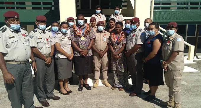 Tokyo 2020 Olympic Games gold medallist Josua Vakurinabili (sixth from left) and bronze medallist Reijeli Daveua (eighth from left) with Fiji Corrections Service personnel, civilians and officers in Naboro on October 12, 2021. Photo: Fiji Corrections Service