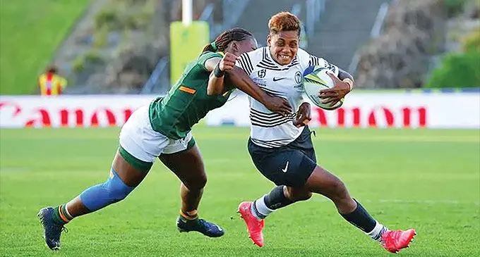 Rooster Chicken Fijiana XVs fullback Roela Radiniyavuni (with ball) tries to escape a South Africa player during their Women’s Rugby World Cup pool match at Waitakere Stadium in Auckland on October 16, 2022. Photo: Rugby World Cup