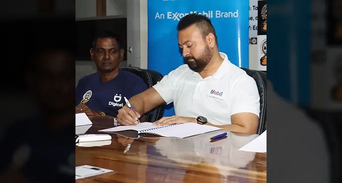 Mobil Oil (Fiji) acting chief executive officer Jatin Kumar signs the renewal contract at Fiji FA headquarters in Suva on September 29, 2023.