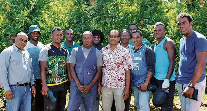 Minister for Employment Jone Usamate (front, fourth from right), with the best RSE Worker Scheme Group from Wayalailai, Yasawa.  Photo: Ministry of Employment, Productivity and Industrial Relations 