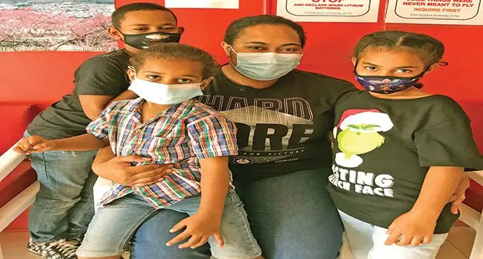 Vasemaca Kuritoga with her children Mohammed Naihrun Junior Khan, Daniel Vakasau Khan and Catherine Aleezah Dilo Khan in Labasa, on August 19, 2021. Photo: Shratika Naidu