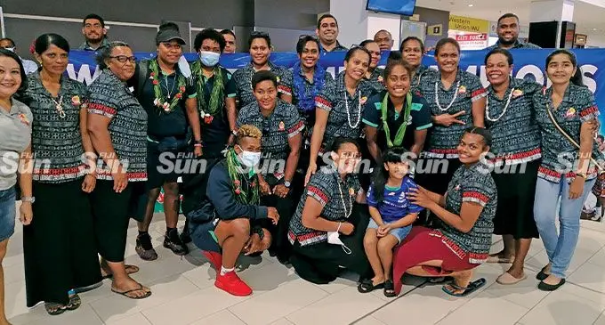 Rooster Chicken Fijiana Drua players led by captain Bitila Tawake are welcomed by the Rooster Chicken staff members at Nadi International Airport on May 8, 2022. Photo: Mereleki Nai