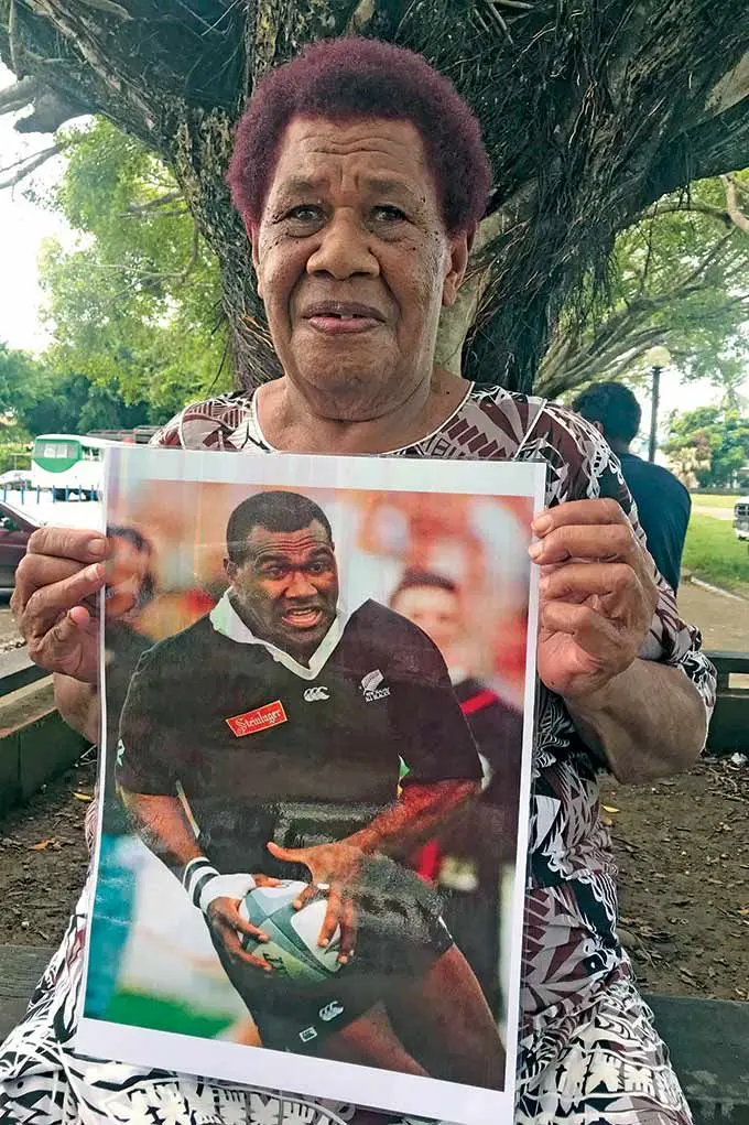 Alumeci Naqera holds up a picture of her son, former Flying Fijian and All Black player Joeli Vidiri in Nadi on March 3, 2022. Photo: Waisea Nasokia.