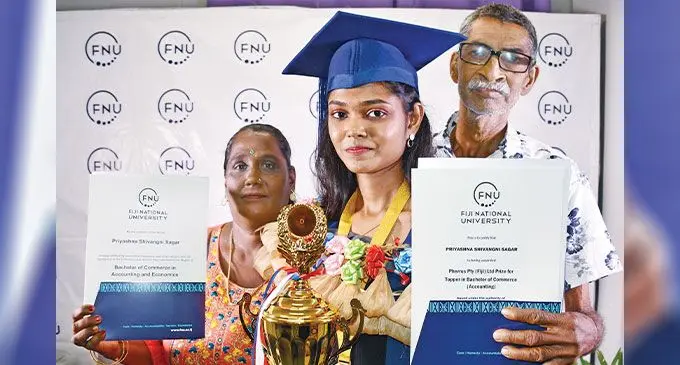 Fiji National University Bachelor of Commerce trophy winner Priyashna Sagar with parents Ram Sagar and Sumitra Devi at the Vodafone Arena on December 10, 2024. Photo: Ronald Kumar
