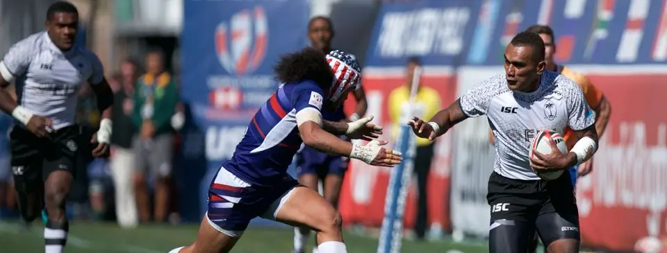 Fiji Airways Fijian 7s wing Eroni Sau tries to fend a USA defender during the USA Sevens Cup semifinal at the Sam Boyd Stadium, Las Vegas in USA, on March 5, 2018. Photo: Bruce Southwick/Zoom Fiji