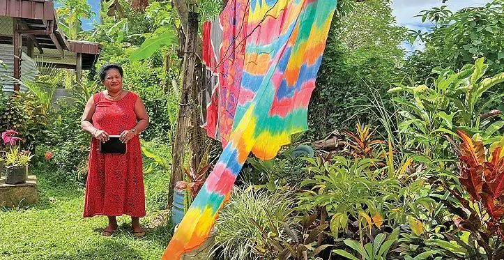 Florist Sainiana Tinai in her backyard. Photo: UNCDF/UNDP