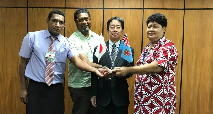 From left: Lavena Primary School headteacher Ilaisa Deke, Habitat for Humanity Fiji national director Masi Latianara, Charge d'Affaires ad interim for Embassy of Japan Tsuguyoshi Hada and Suva Special School headteacher Makereta Musukasau after the signing of grant at Japan Embassy in Suva on March 10, 2018. Photo: Ashna Kumar