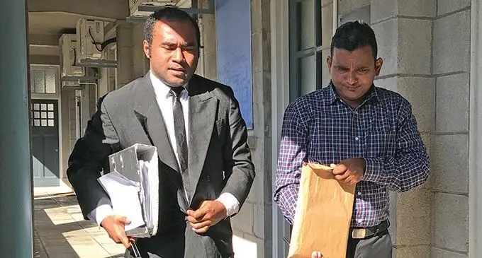 Anirudh Sharma (right), with his lawyer outside the Civil High Court in Suva on July 15, 2019.  Photo: Ashna Kumar