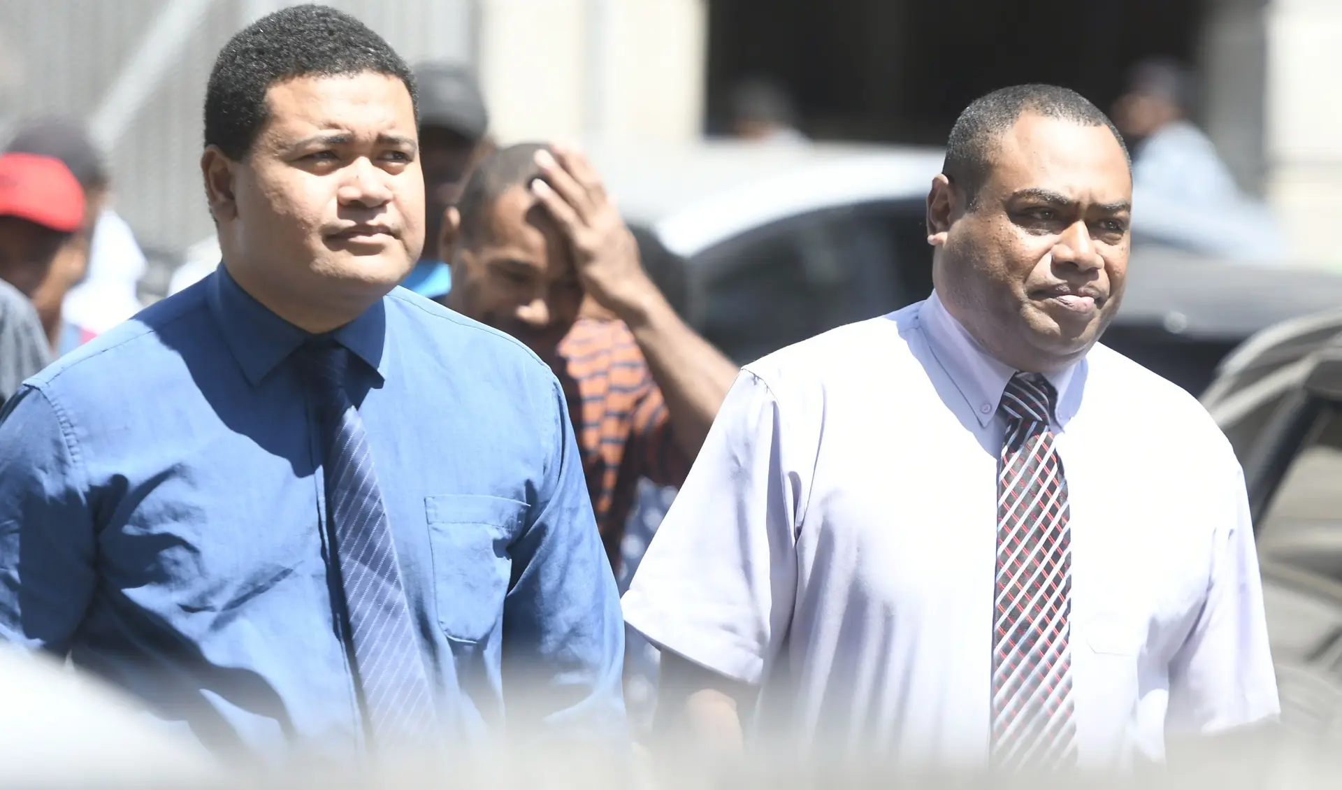 Suspended police offices Ratu Lote Lewaivanua and Seveloni Lobi outside the Suva Magistrate Court on November 11, 2025. 