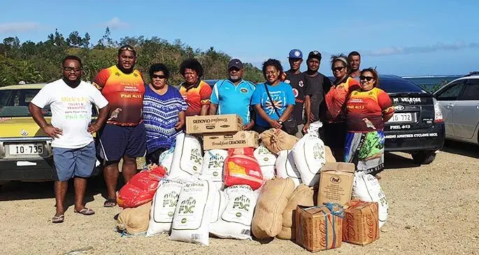 Mick’s Fiji Tours and Transfers team with the items ready to be distributed to the villagers in Vatulele Island.