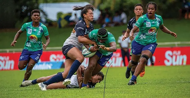 Strong running Rooster Chicken Fijiana Drua second five eight Merewai Cumu takes on the Brumbies players with first five eight Ani Mei (left) and flanker Sulita Waisega in support during their Super W opener at Prince Charles Park in Nadi on March 25, 2023. Photo: Leon Lord