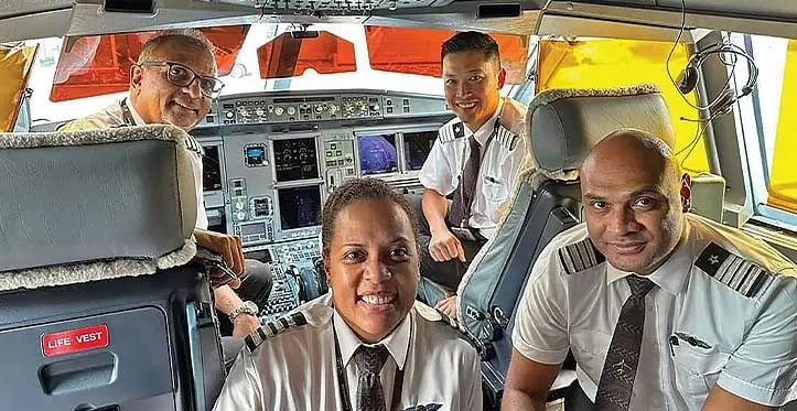 Back row, from left: Captain Mukesh Patel (Check and Training Captain A330 & 350) and Captain Richard Yuen (Senior Manager Flight Operation). Front row: Captain Seini Cornish and Captain Etika Tuisue.