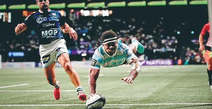 Winger Vinaya Habosi dives over to score one of his tries for Racing 92 as they walloped Bayonne 55-14 in the French Top 14 clash at the La Defence Arena in Nanterre, Paris, on May 6, 2023. Photo: Midi Olympique