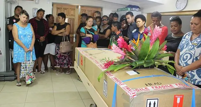 Friends ands family farewell Thomas Riley at the Rarotonga Hospital in the Cook Islands. The late Mr Riley will be laid to rest in Taveuni.