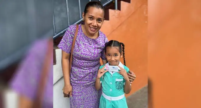Buna Fong with her daughter Faith Vakatawa after receiving her first dose of the COVID-19 vaccine at Nehru Memorial Primary School in Toorak, Suva on July 6, 2022. Photo: Nolishma Narayan