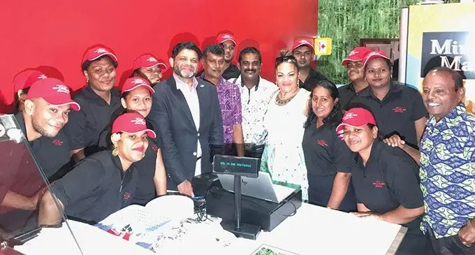 Attorney-General and Minister for Economy Aiyaz Sayed-Khaiyum with All in One Builders Cakes and Fast Food owner Sulendra Raju and his staff in Nadi. Photo: Waisea Nasokia