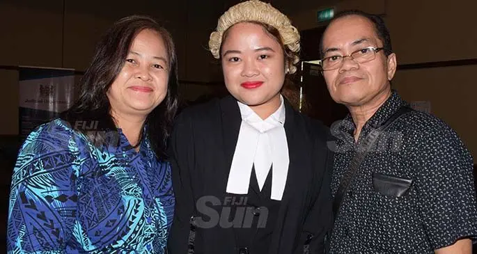 Monica Aguilar (second from left) is congratulated by parents, Estrella and Moises Aguilar following her admission to the Bar by Acting Chief Justice Kamal Kumar at the Grand Pacific Hotel on August 7, 2020. Photo: Ronald Kumar